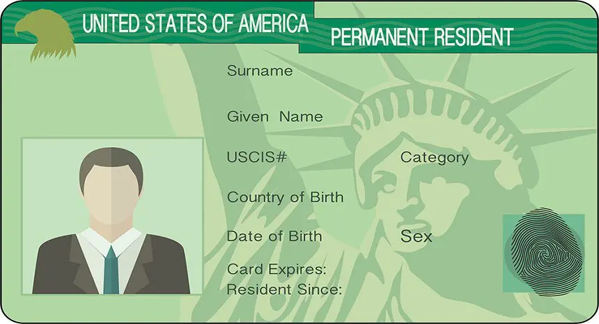 A green card with the statue of liberty and a person 's photo.