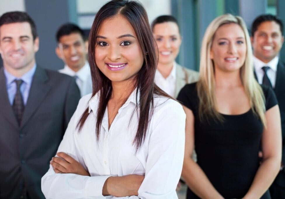 A group of people standing in front of each other.
