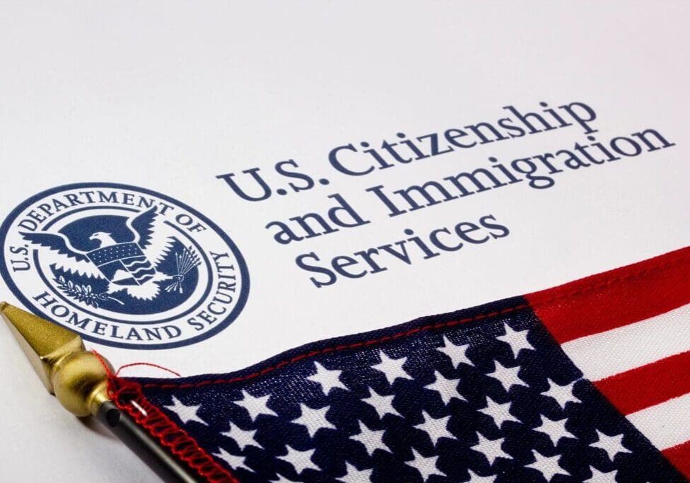 A close up of the u. S. Citizenship and immigration services logo